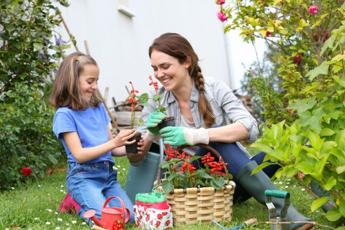 Gardener working in a West Wickham garden with professional plant care
